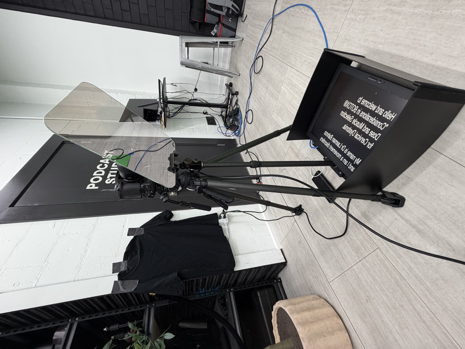 Podcast studio camera-mount teleprompter setup