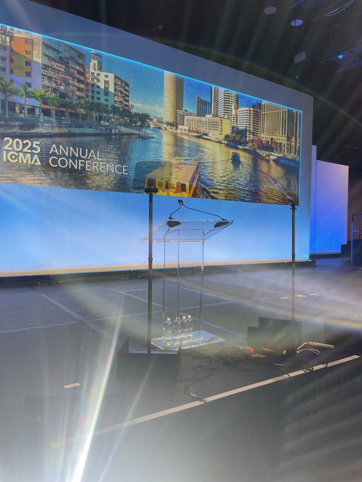 Conference keynote stage with presidential teleprompter glass